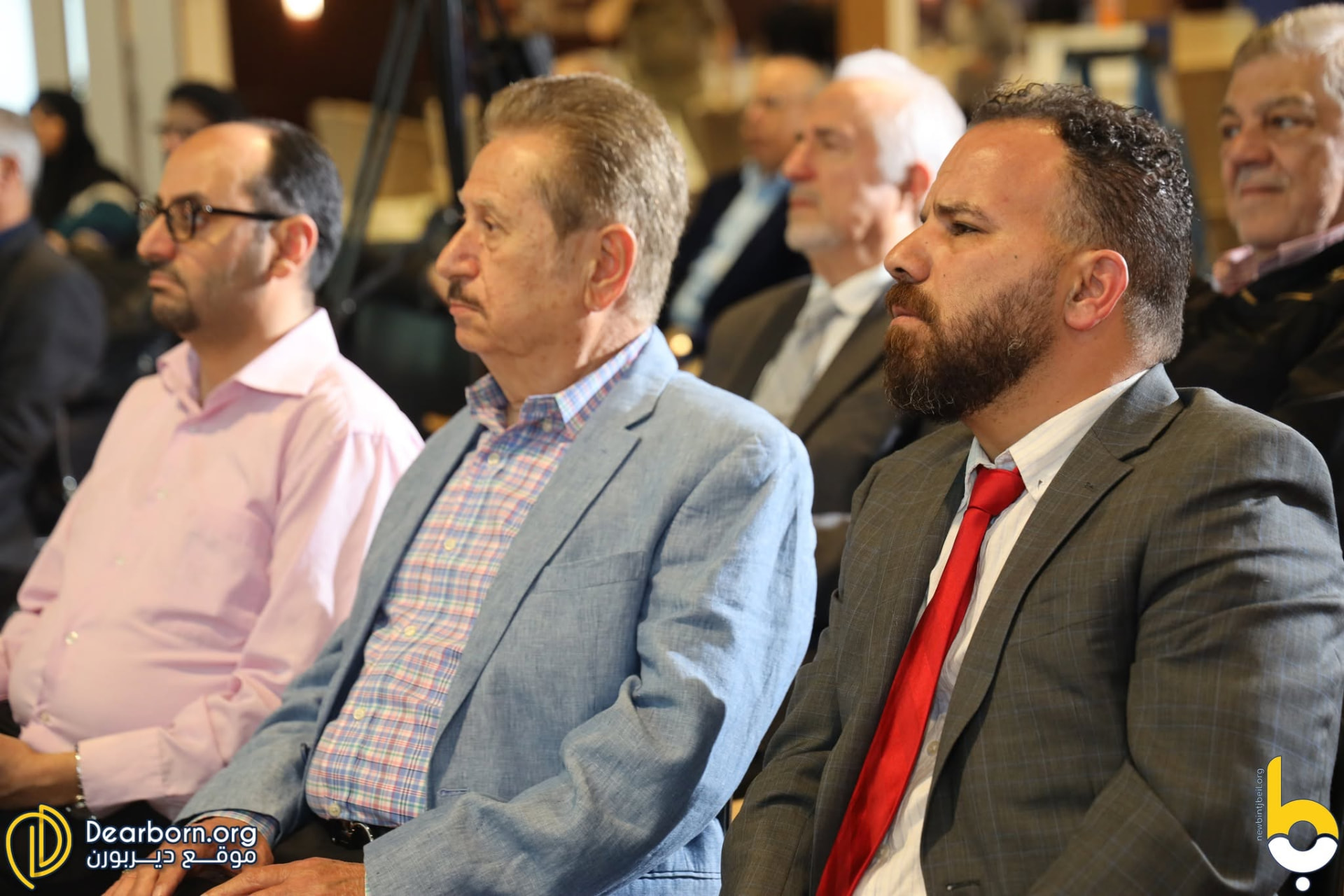 Business leaders listening during a session